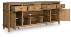 Sharlance - XL TV Stand With Fireplace Option - Light Brown