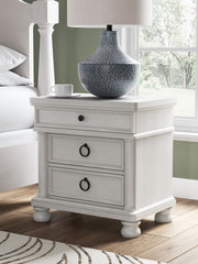 Rowlenstown - Three Drawer Night Stand